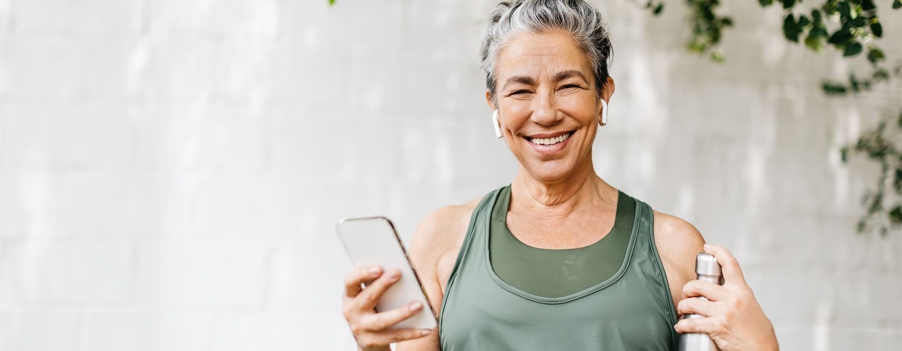 a woman holding a phone