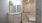 a bathroom with a shower and sink