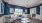 a clubroom with a couch and chairs