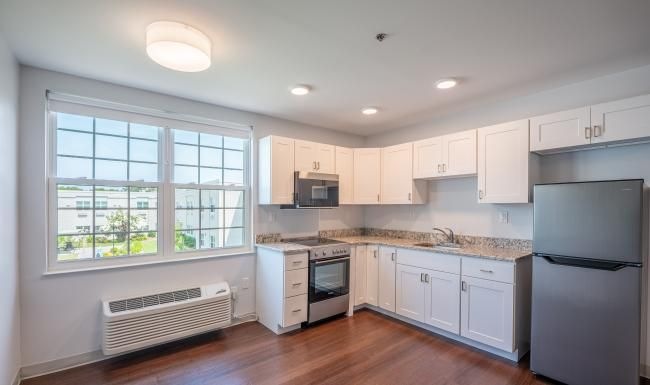 Beautiful kitchens with designer finishes a kitchen with white cabinets